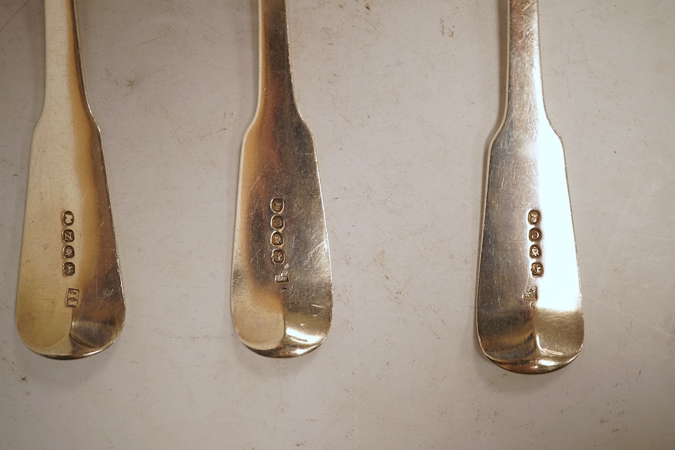 A matched set of six George III silver fiddle pattern table spoons, including four by Eley, Fearn and Chawner, London, 1820 and two London, 1808, 14.2oz.